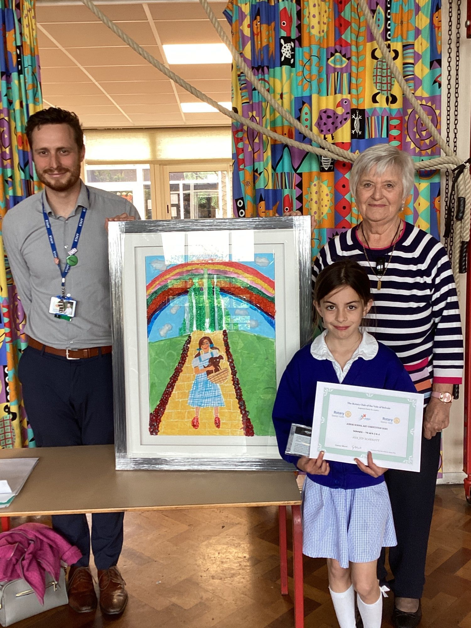 Ava with her winning artwork